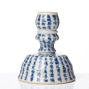 A blue and white candle stick, Qing dynasty, 19th Century.