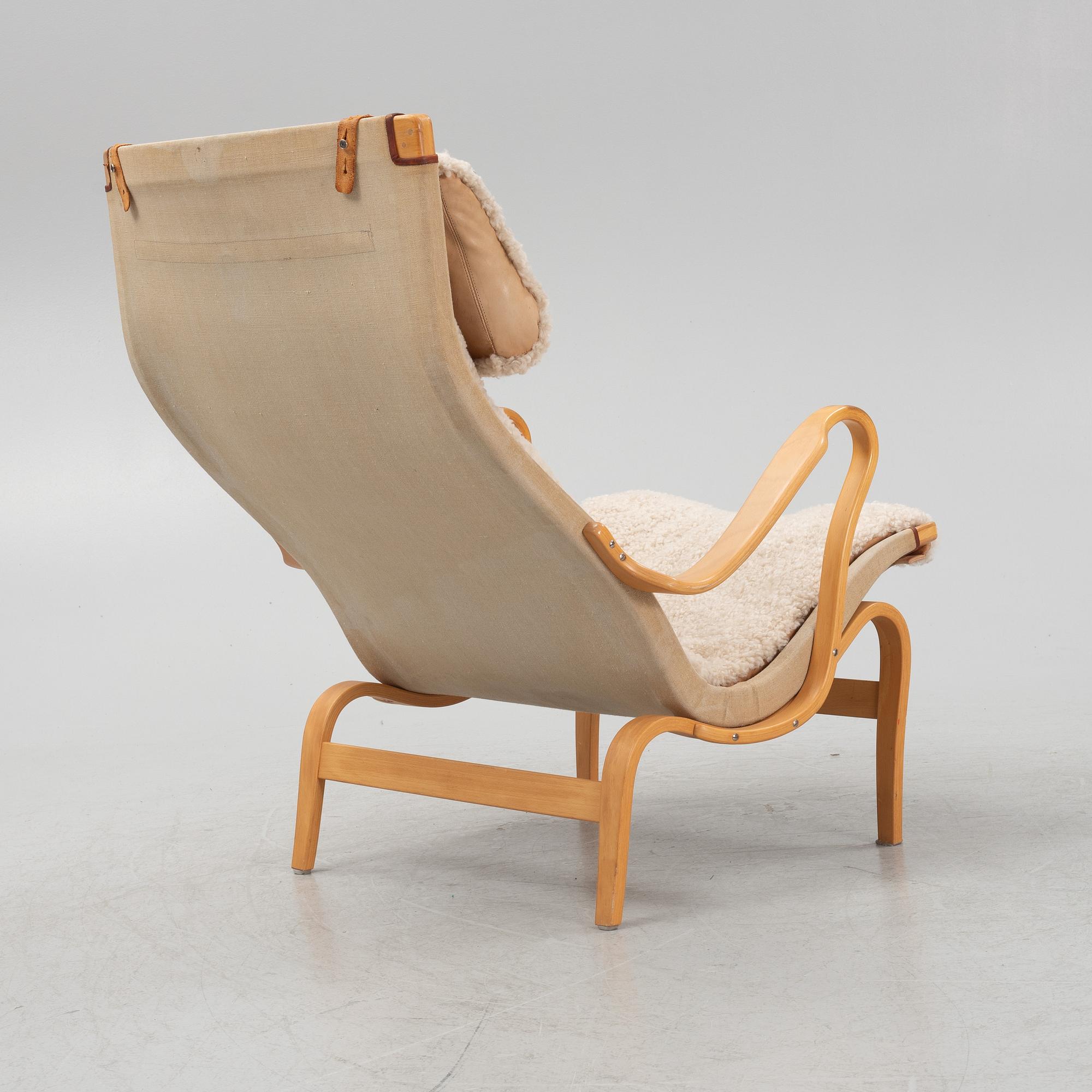 Bruno Mathsson, a 'Pernilla' armchair, Dux, late 20th century.