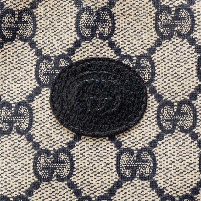 a 1980's Gucci bag and purse.