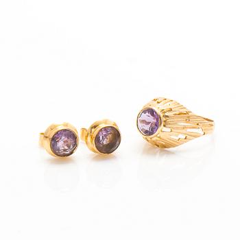 A set of 14K gold earrings and a ring with amethysts.