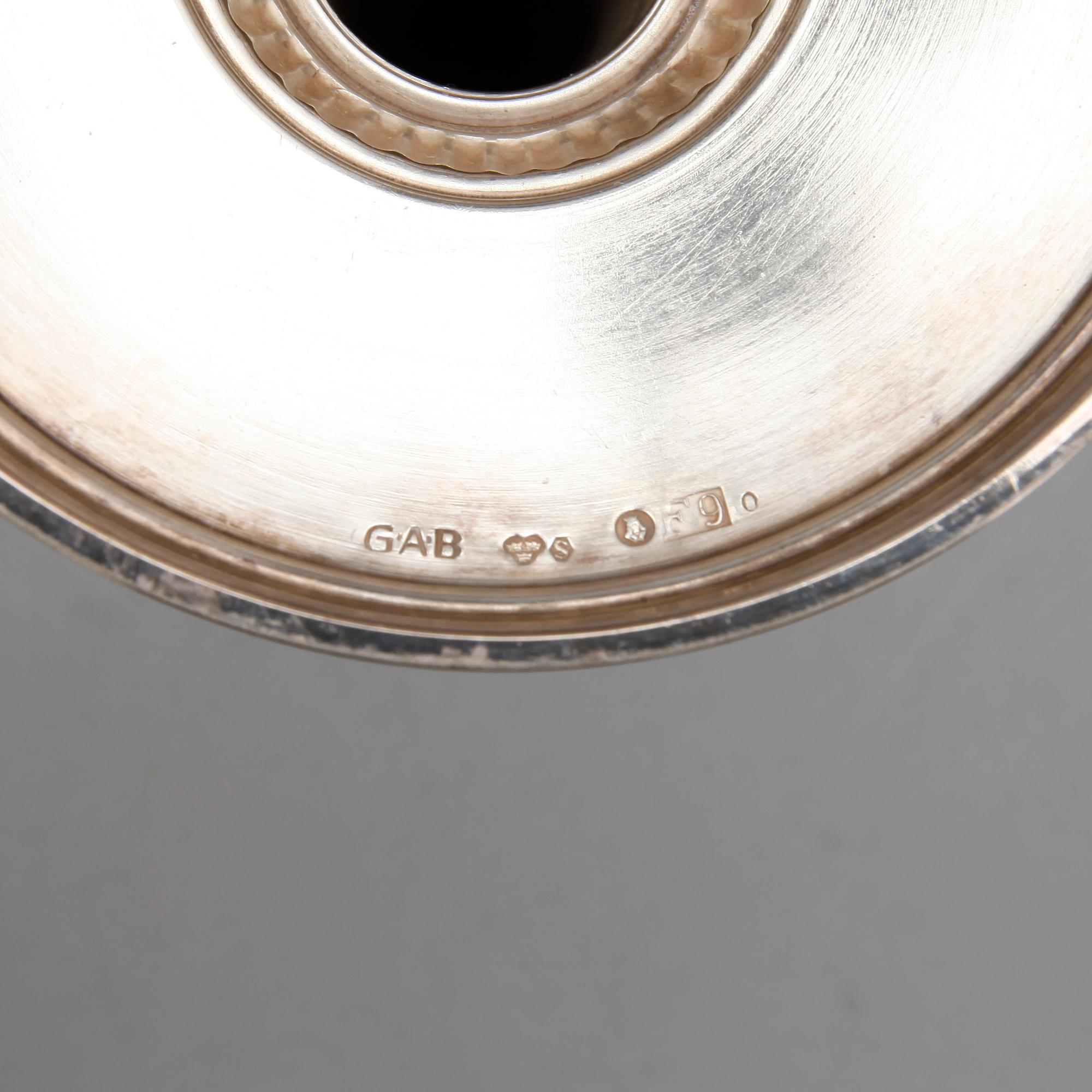 LJUSSTAKAR, ett par. Silver. Ainar Axelsson, GAB, Stockholm, 1956. Totalvikt: ca 324 gram.