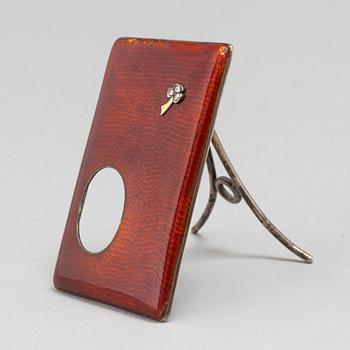 A Russian silver and enamel frame by a unknown master, 1896-1908.