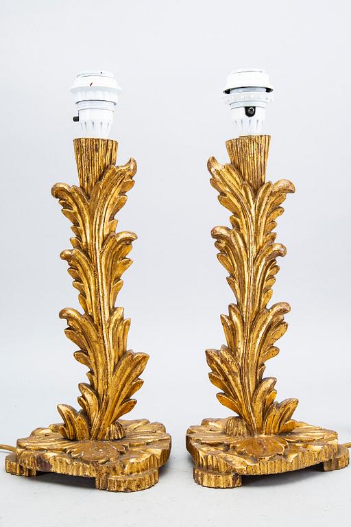 A set of four wood table lamps from Paoletti, Firenze Italy, second half of 20th century.