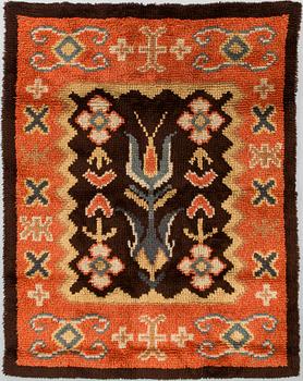 Aino Baeckman, a 1930s Finnish ryijy rug for Neovius. Circa 145x113 cm.