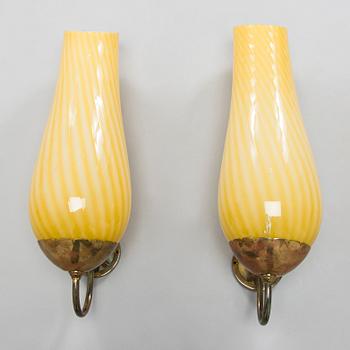 A pair of mid-20th century Finnish wall lights.
