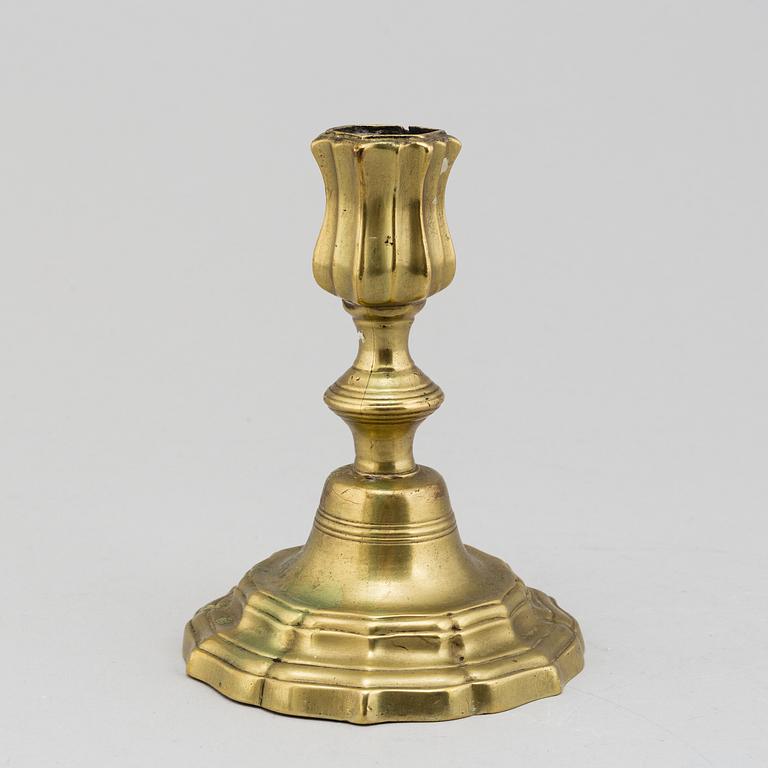 An 18th century rococo argent haché candlestick.