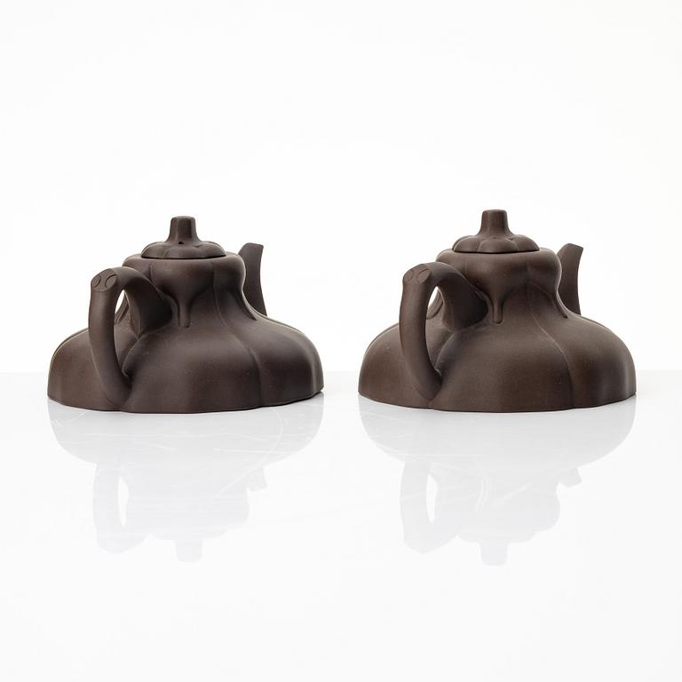 Two similar 'magnolia flower six-petal' yixing teapots, China, 1980s.