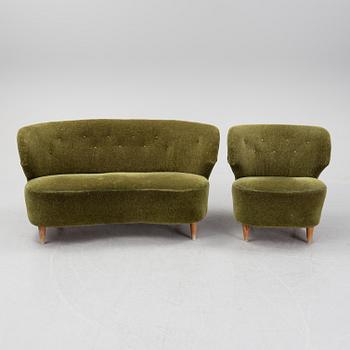 A sofa and easy chair, 1940s/50's.