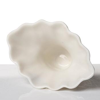 A blanc de chine rhinoserous libation cup, Qing dynasty, Kangxi (1662-1722).