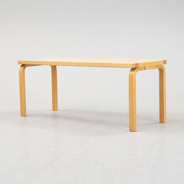A bench and a stool by Alvar Aalto, from around the year 2000.