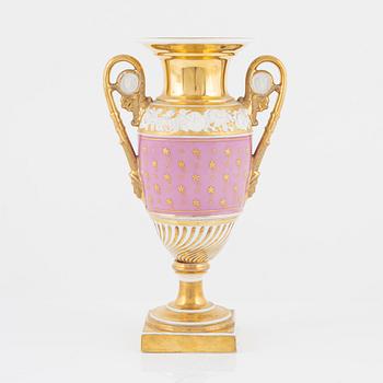 A gilt Empire porcelain vase, 19th Century.