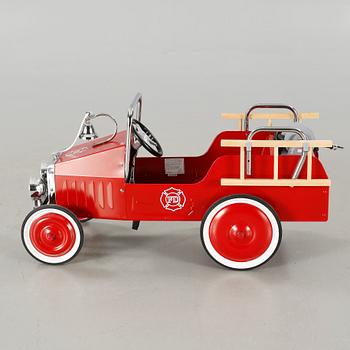 A child´s pedal car from the fourth quarter of the 20th century.
