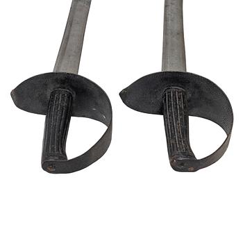 Two 19th century naval cutlasses.