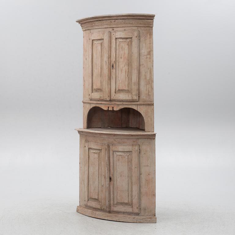 A Gustavian corner cabinet, circa 1800.
