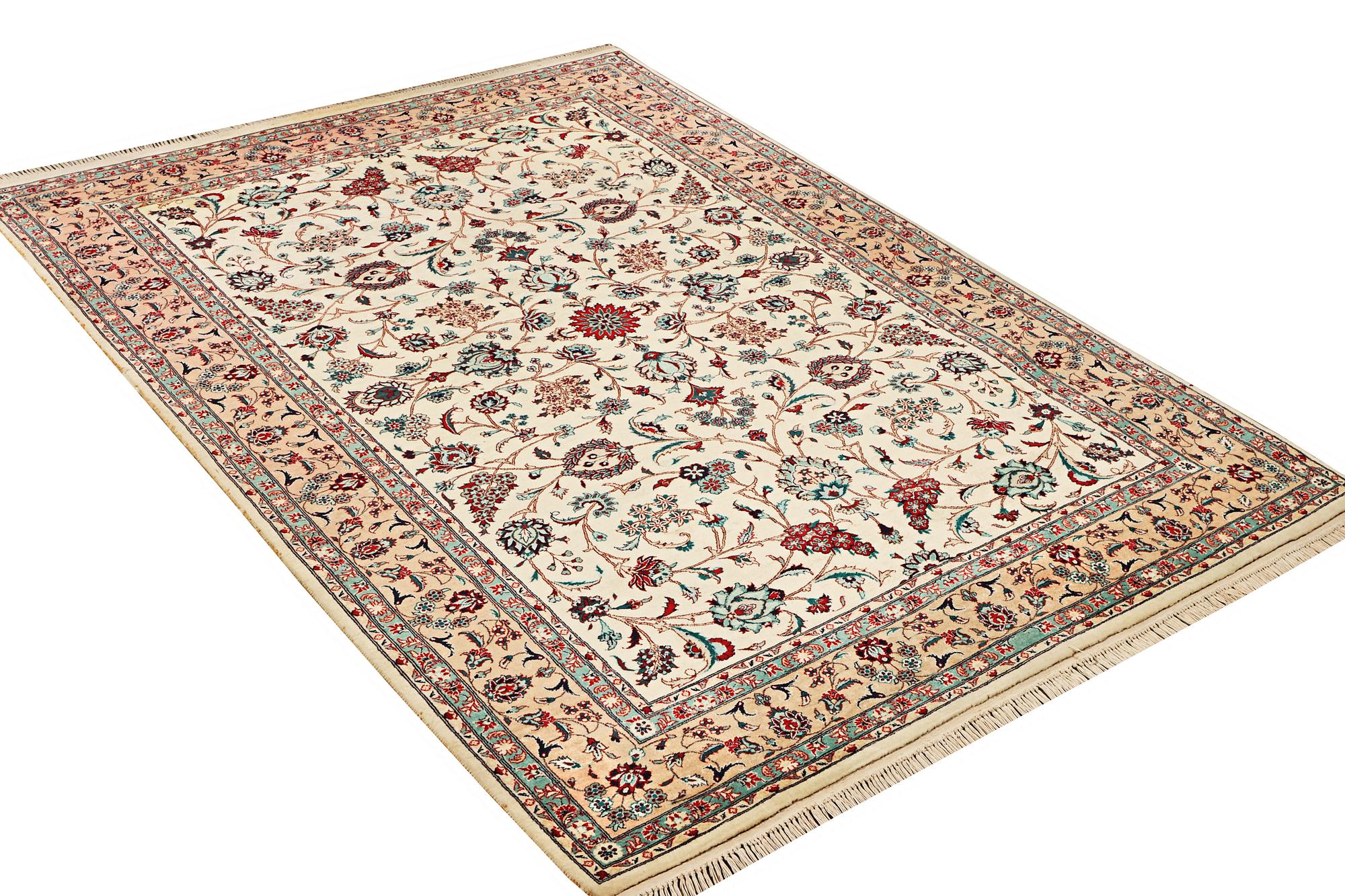 An oriental silk carpet, a. 280 x 185 cm.