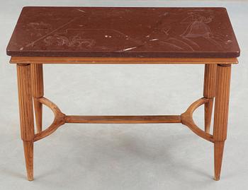 A Swedish Modern oak and limestone table, the top with engraved scenes, signed US, 1940's.