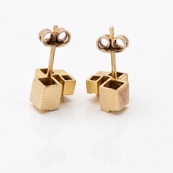 A pair of 18K gold earrings.