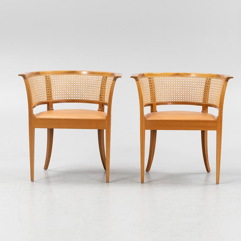 Kaare Klint, a pair of mahogany and natural leather 'Fabourg Chairs', Rud. Rasmussen, Denmark, late 20th Century. .