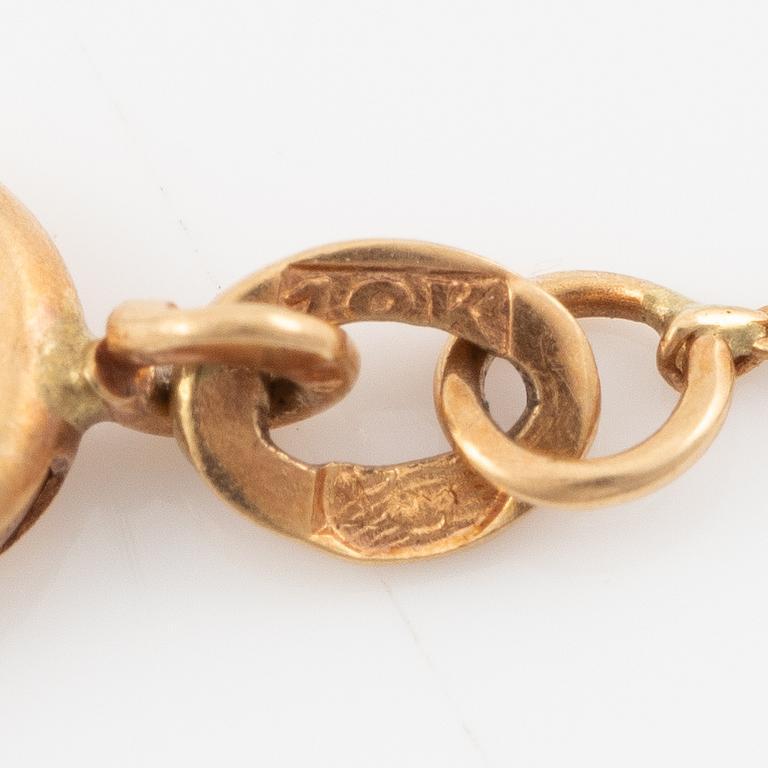 Collier 18K guld och platina med en pärla och rosenslipade diamanter.