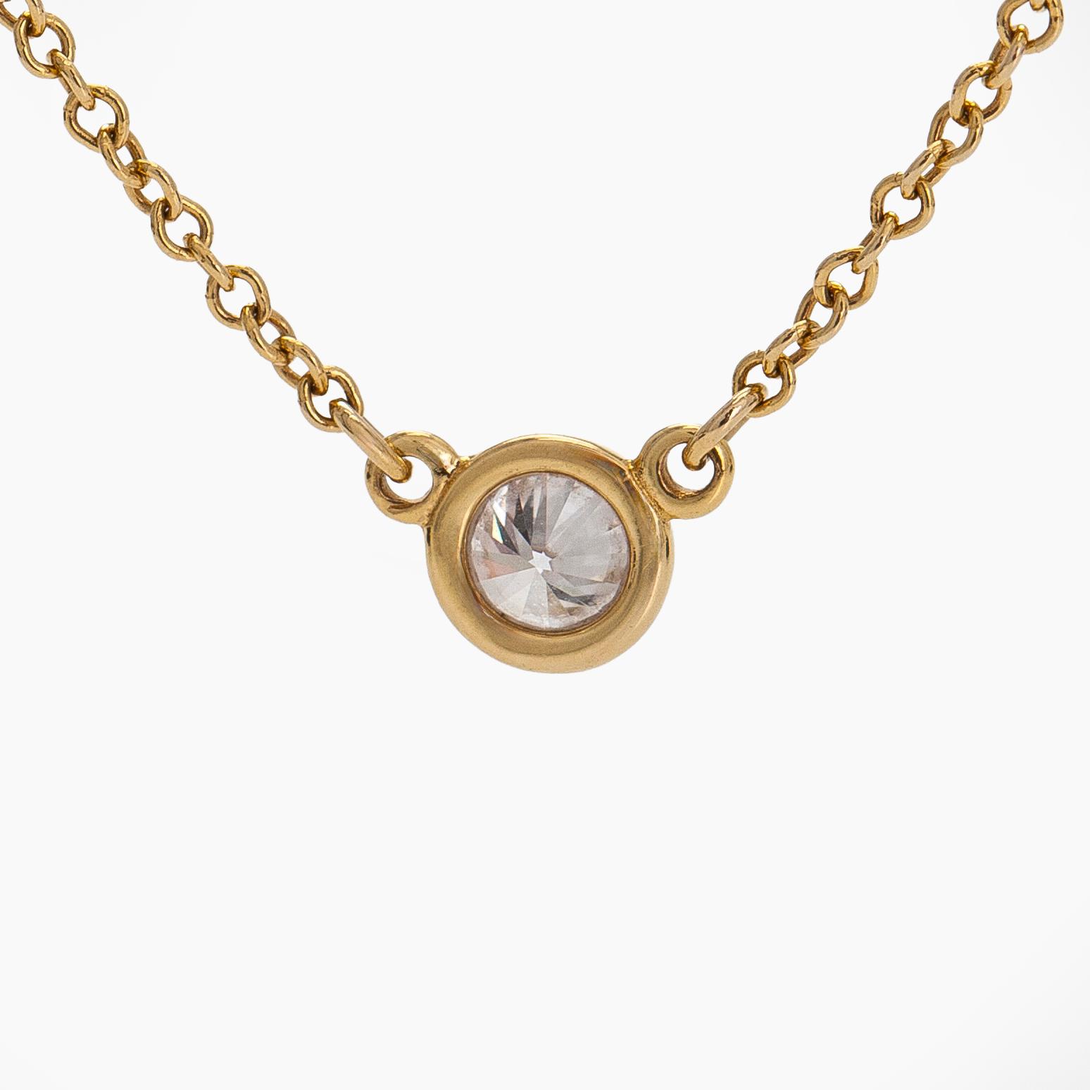 Tiffany & Co, Elsa Peretti, an 18K gold 'Diamonds by the Yard' necklace with a brilliant-cut diamond.
