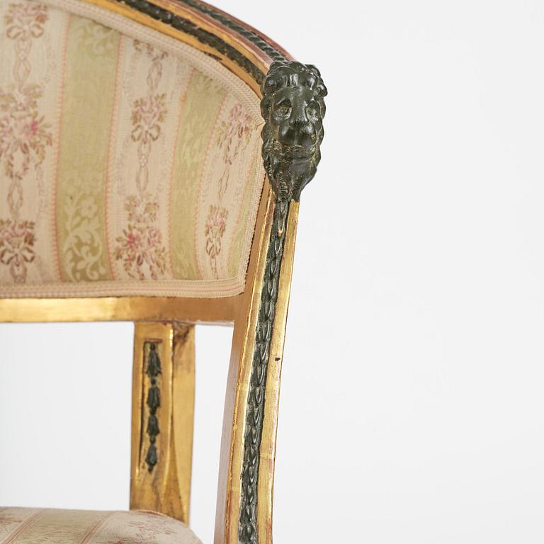 A pair of late Gustavian giltwood open-back armchairs, Stockholm, late 18th century.