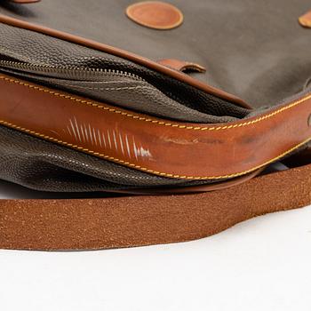 Mulberry, a scotch grain suitcase.