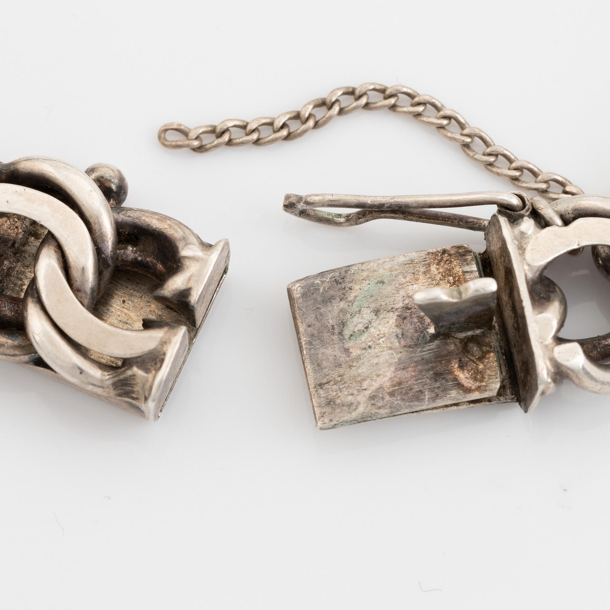 Silver bracelet.
