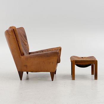 Illum Wikkelsø, a model V11 armchair and an ottoman by other maker, 1960's.