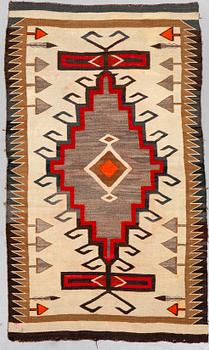 A textile, flat weave, Navaho, ca 186 x 108 cm.