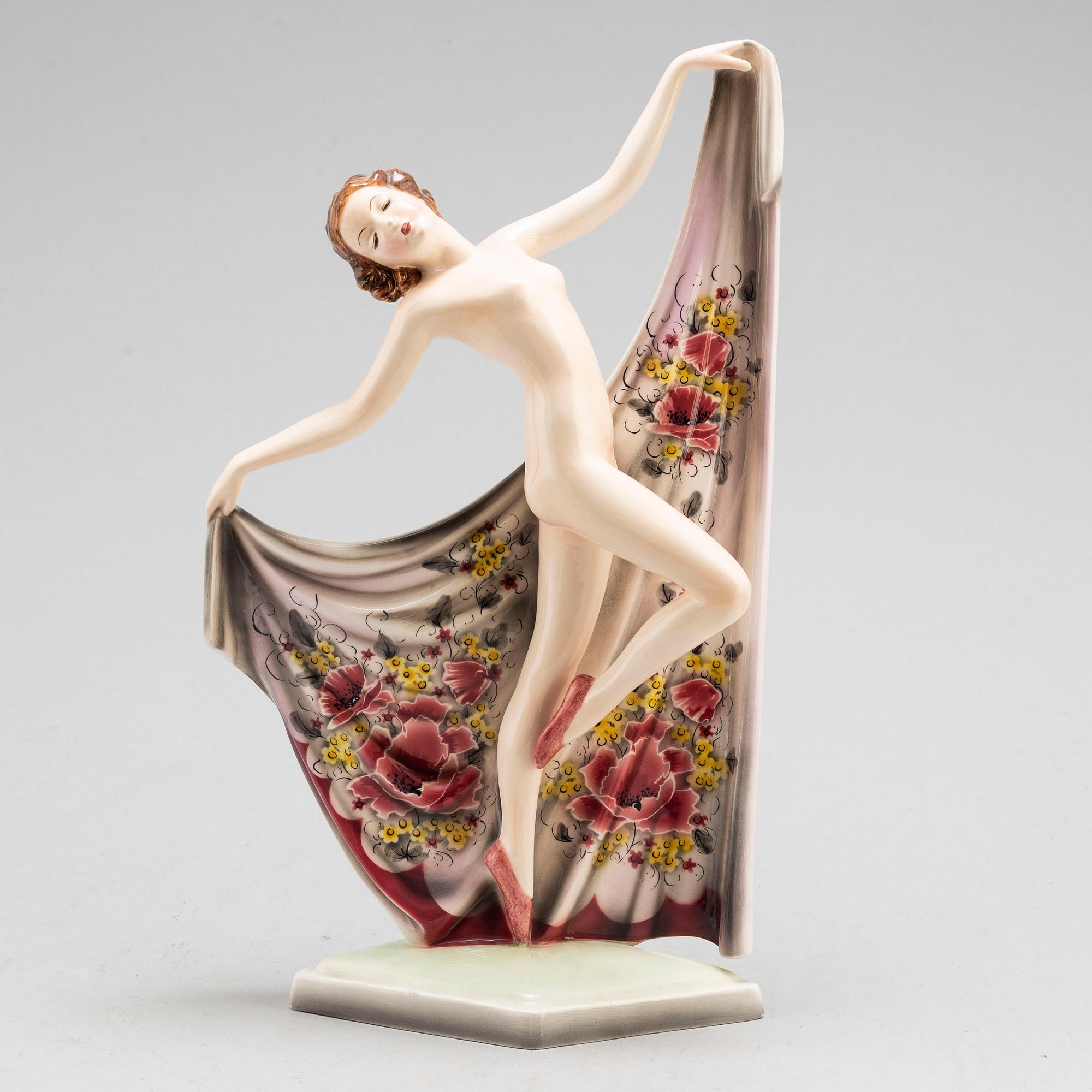 A porcelain figurine by Goldscheider, Vienna.