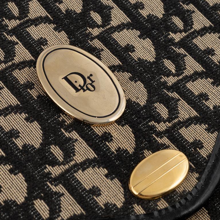 Christian Dior, A monogram canvas weekendbag and a clutch, vintage.