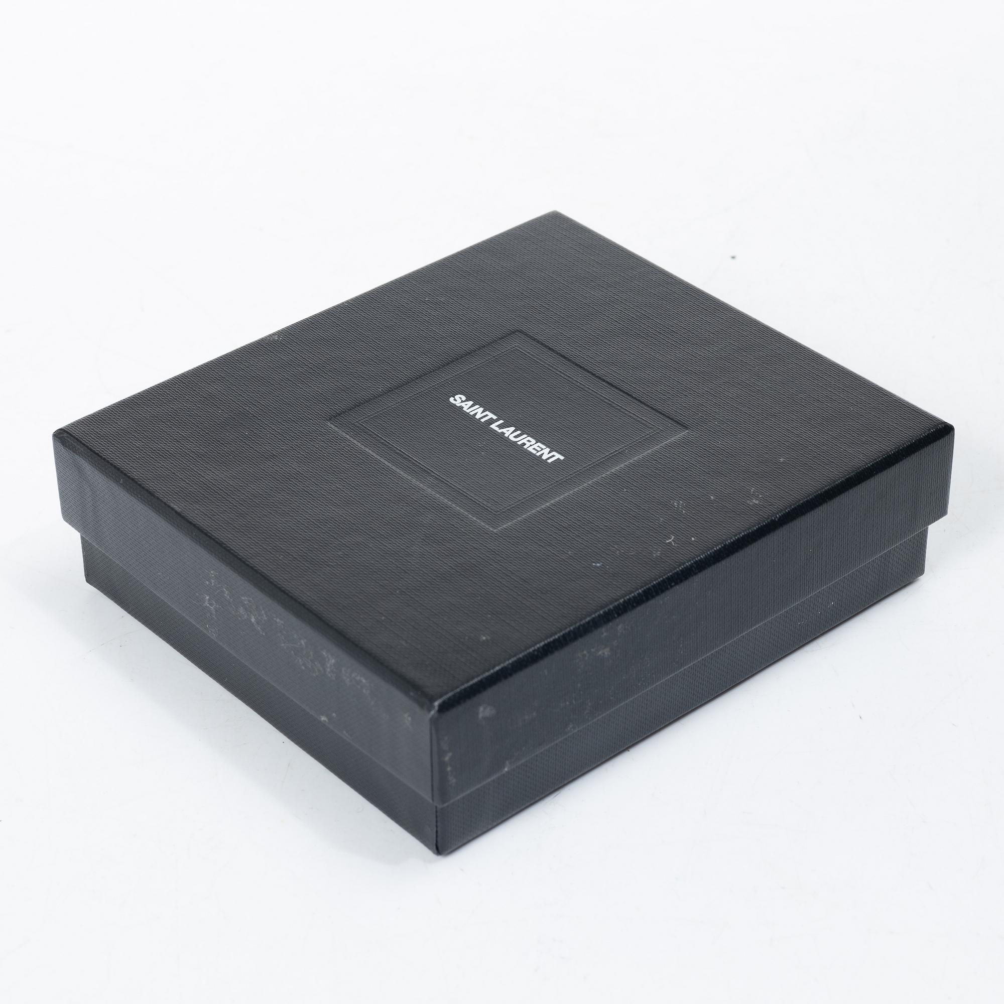 Yves Saint Laurent, bracelet.