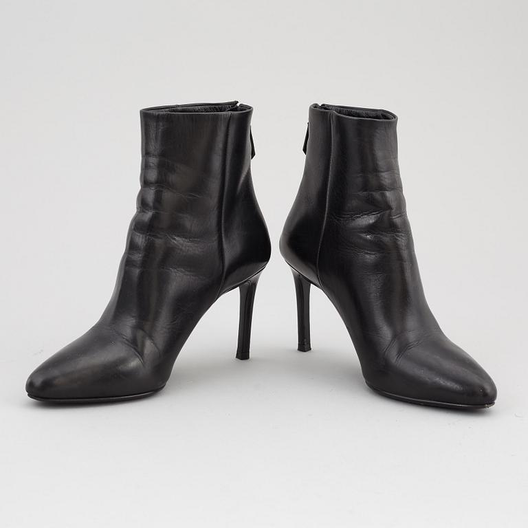 PRADA, a pair of black leather boots, size 35.