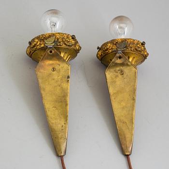 A pair of Louis XVI-style wall lights, early 20th century.