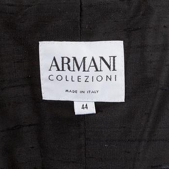ARMANI, a beige and black evening jacket. Italian size 44.-.