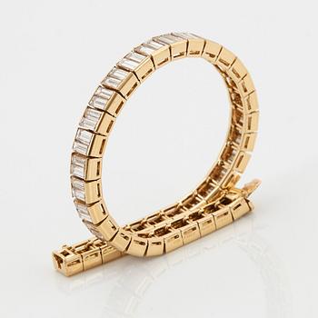 Van Cleef et Arpels armband 18K guld med baguetteslipade diamanter "Bracelet Baguette".