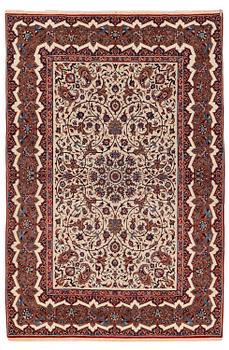 412. An antique Isfahan rug, Central Iran, c. 228 x 139 cm.