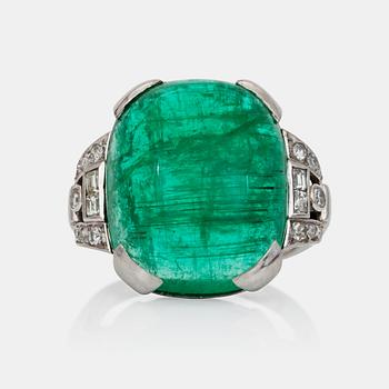 A circa 18.00 ct cabochon-cut emerald and diamond ring. Total carat weight of diamonds circa 0.30 ct.