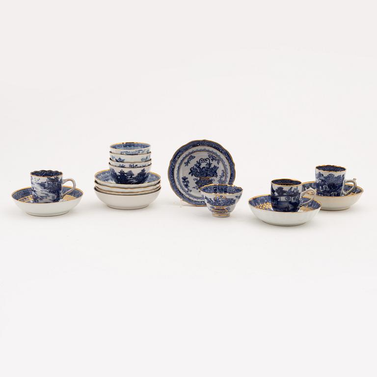 A set of nine gilt and blue and white cups with saucers, Qing dynasty, Qianlong (1736-95).