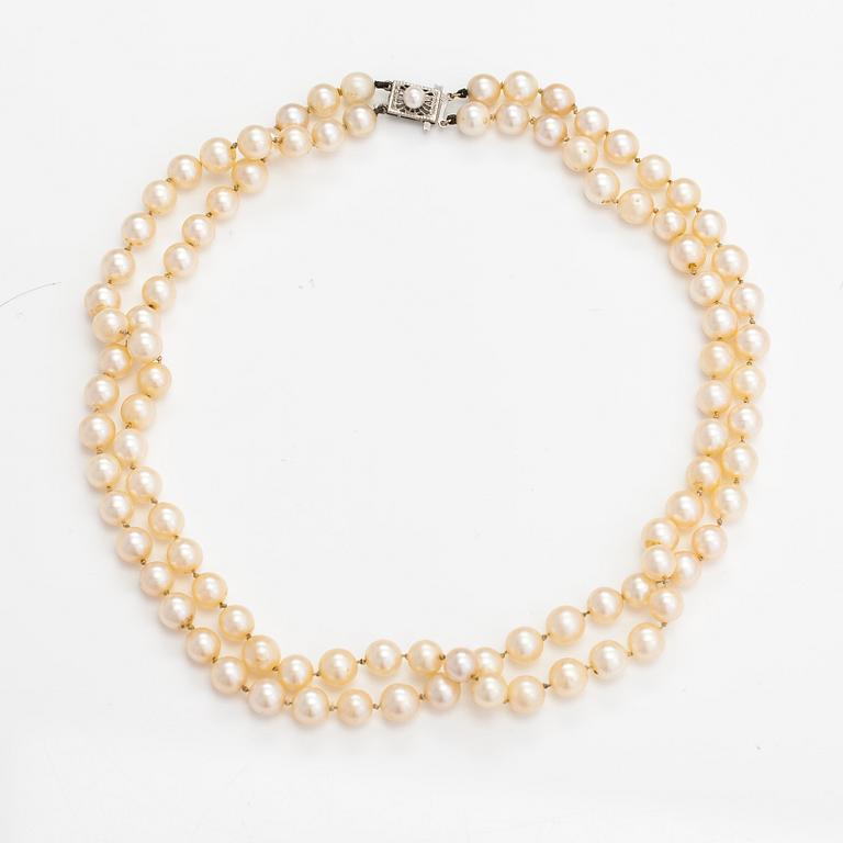 A 2-strand pearl collier with cultured pearls and a 14K white gold clasp.
