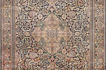 A Kashmir carpet, silk, c. 333 x 234 cm.