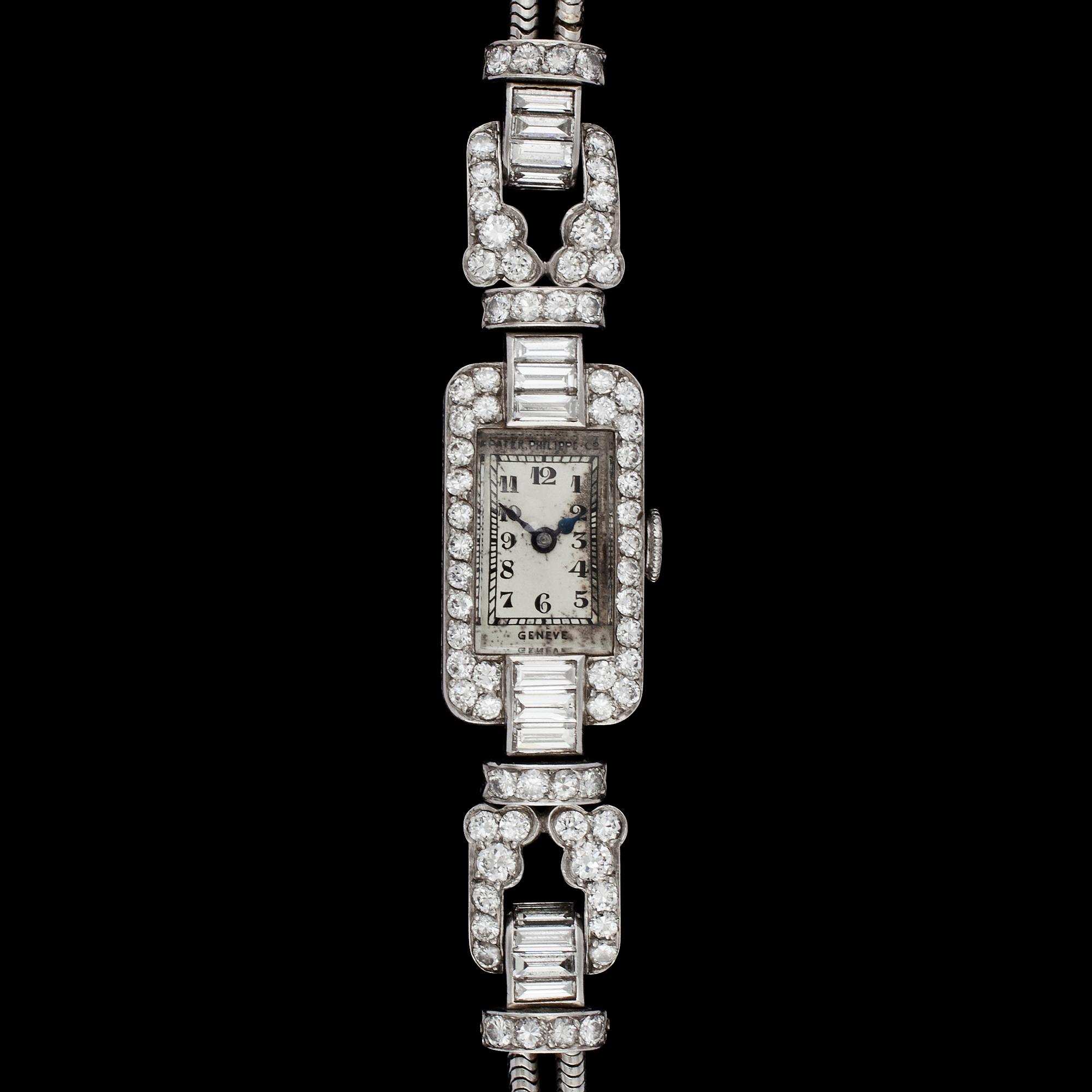 A diamond ladie's wrist watch, tot. app. 4 cts.