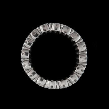 A flexible brilliant-cut diamond ring. Total carat weight circa 6.01 cts.
