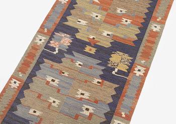 Märta Måås-Fjetterström, a carpet, 'Tolvbladsmattan', flat weave, c. 205 x 95 cm, signed MMF.