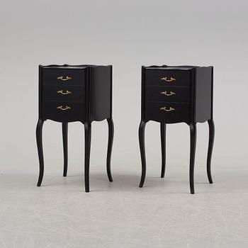 A pair of rococo style bedside tables, 20th century.