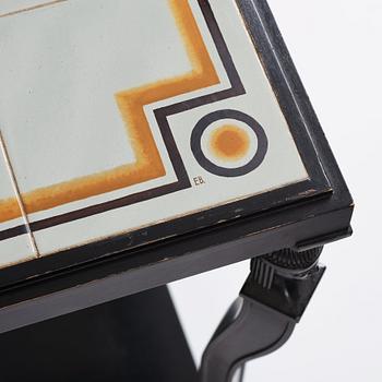 Axel Einar Hjorth, an ebonised oak Swedish Grace tiled top table, Nordiska Kompaniet 1931. Tile top by Edgar Böckman.