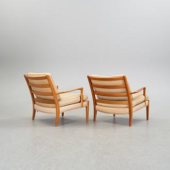 A pair of easy chairs by Arne Norell, late 20th century.