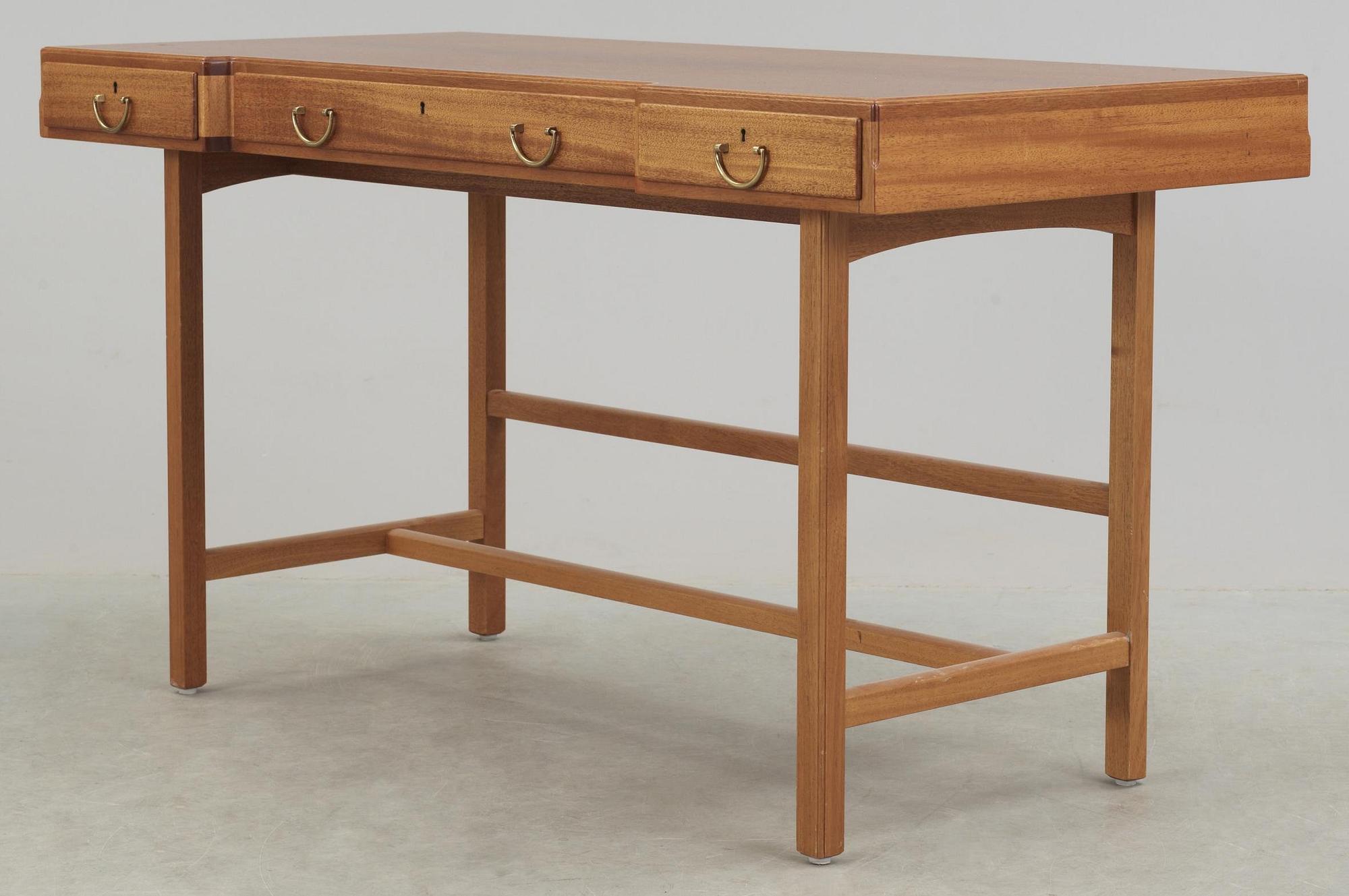 A Josef Frank mahogany desk, Firma Svenskt Tenn, model 1022.