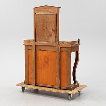 An Empire style dressing table by Johan Öman, Stockholm (1815-33), dated 1827.