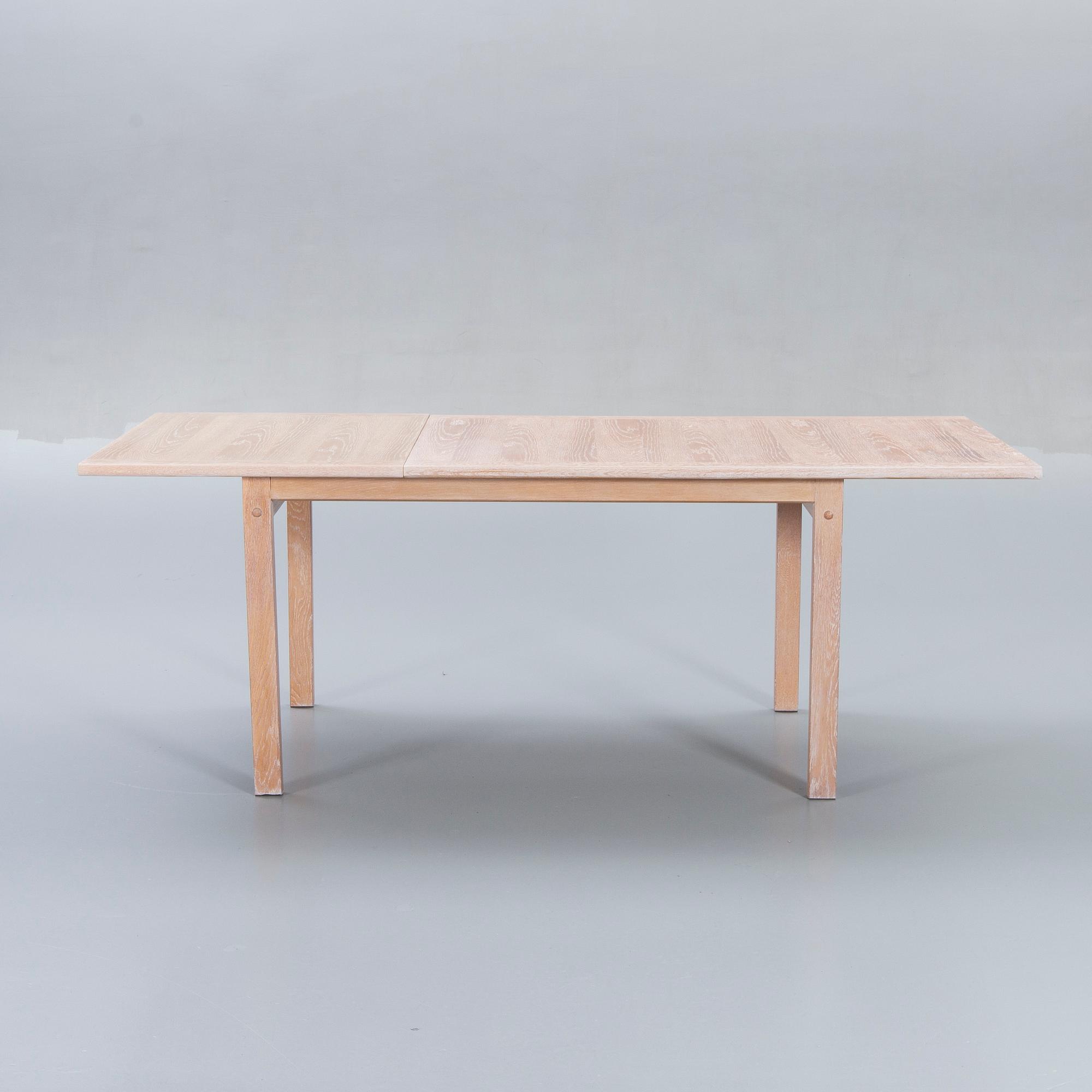 A Danish 1960s dining table and 6 chairs,